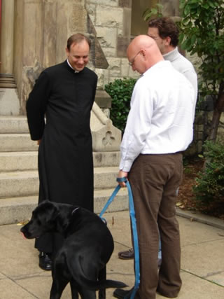 Rector, parishioners and their dog
